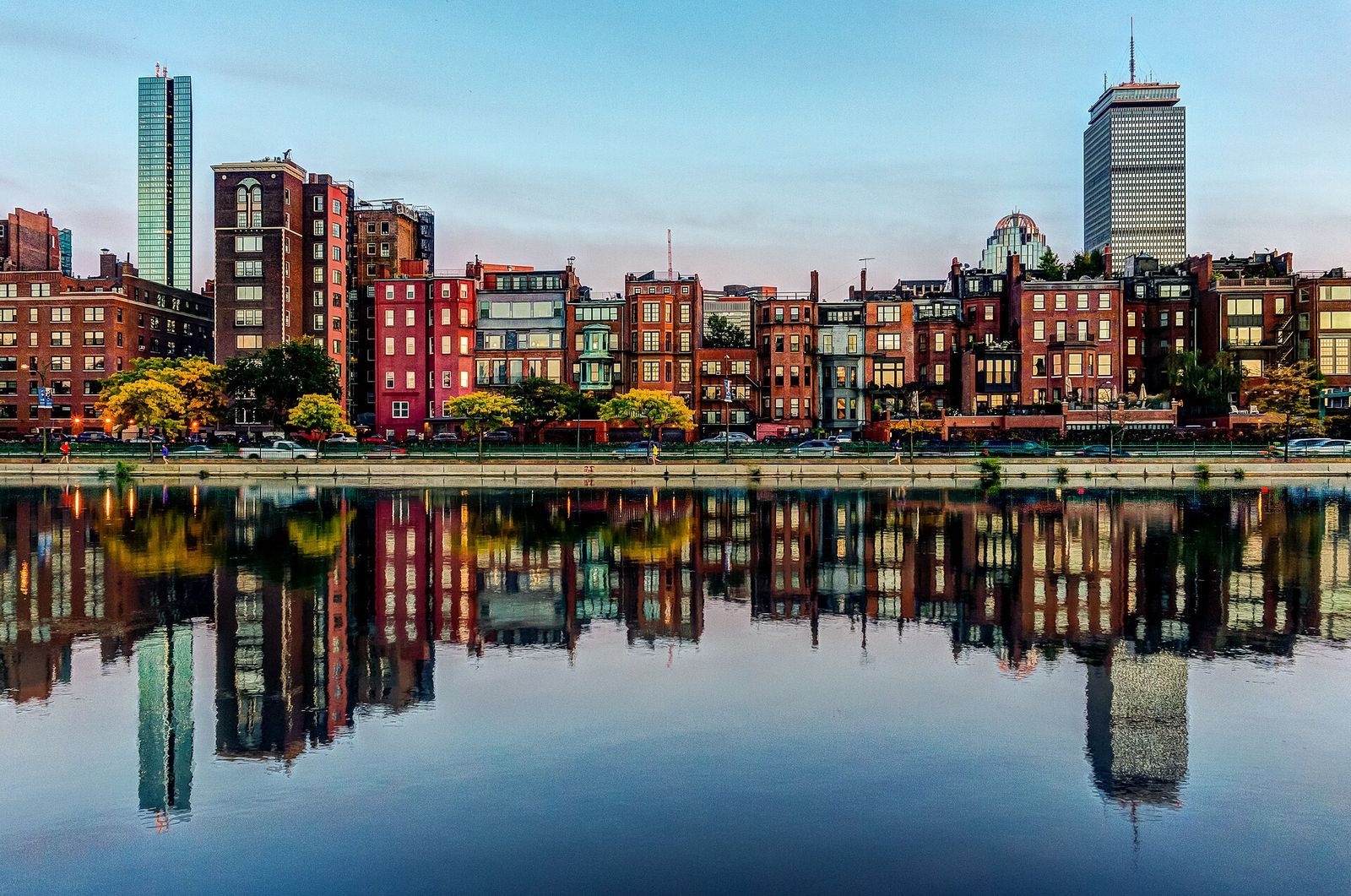 Boston row houses reflected in the Charles River